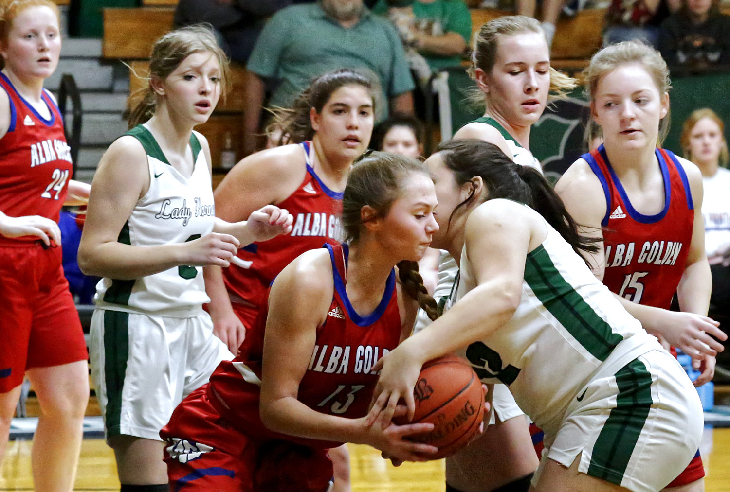 The first half of Alba-Golden’s season finale was a close affair, as illustrated by the struggle for the ball. Lady Panthers photographed (l-r) are Kylie Kennedy, Erin Langston, Kalli Trimble and Cacie Lennon.